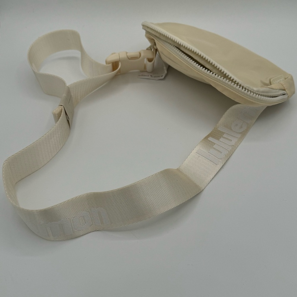 Lululemon 1L Everywhere Belt Bag Cream with logo strap